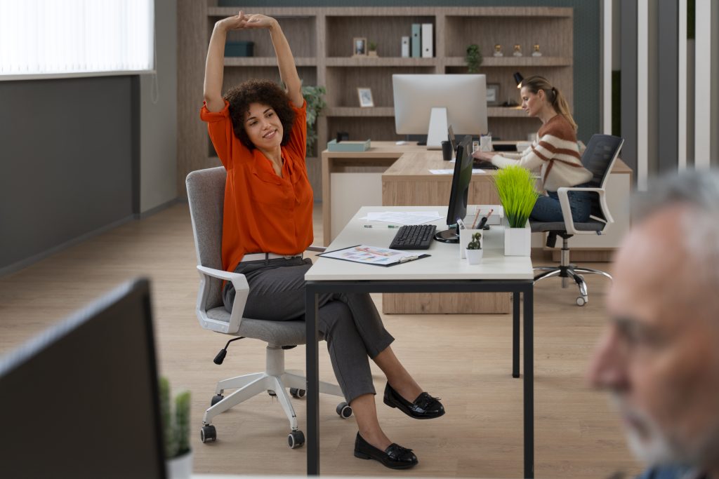 woman office stretching work day